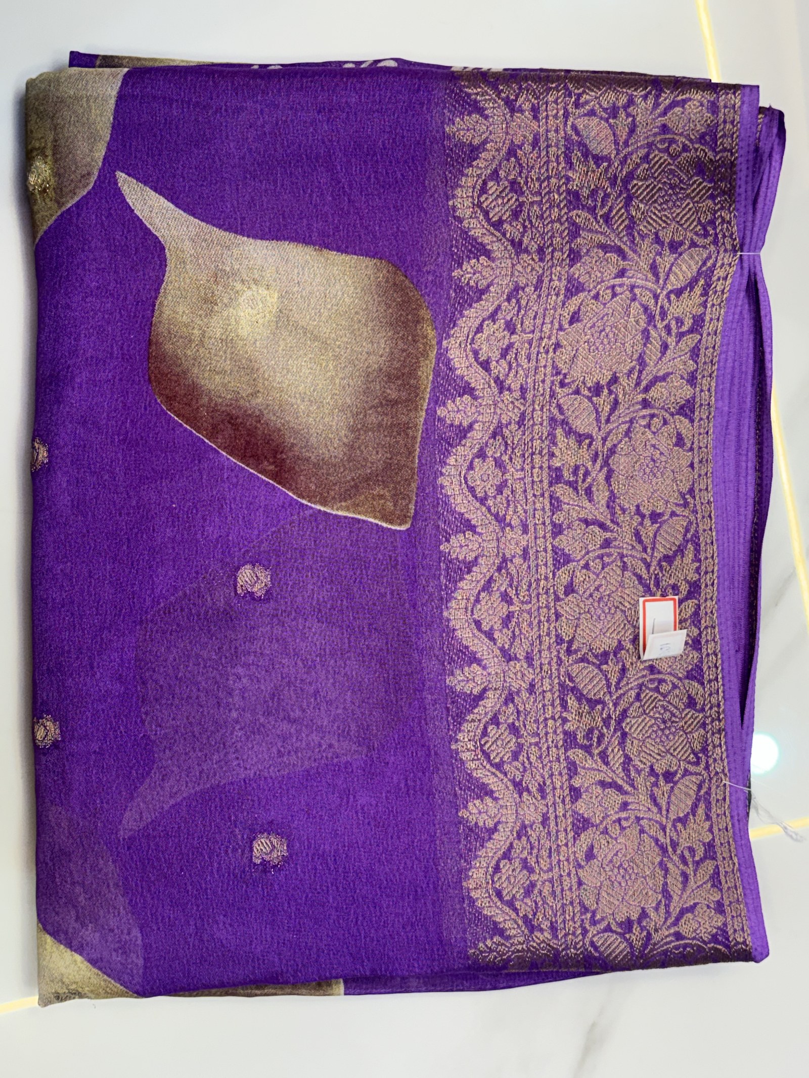 Violet saree with gold woven detailing